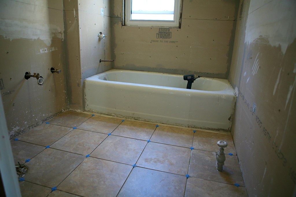 Bathroom re-plumb with new tiling in progress