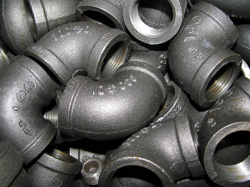 Close-up of black iron pipe fittings
